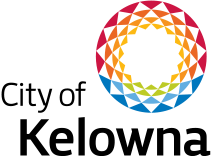 Un logotipo circular geométrico y colorido con un degradado de rojo a azul. El texto "Juegos Panamericanos" está escrito en negro debajo del logotipo.