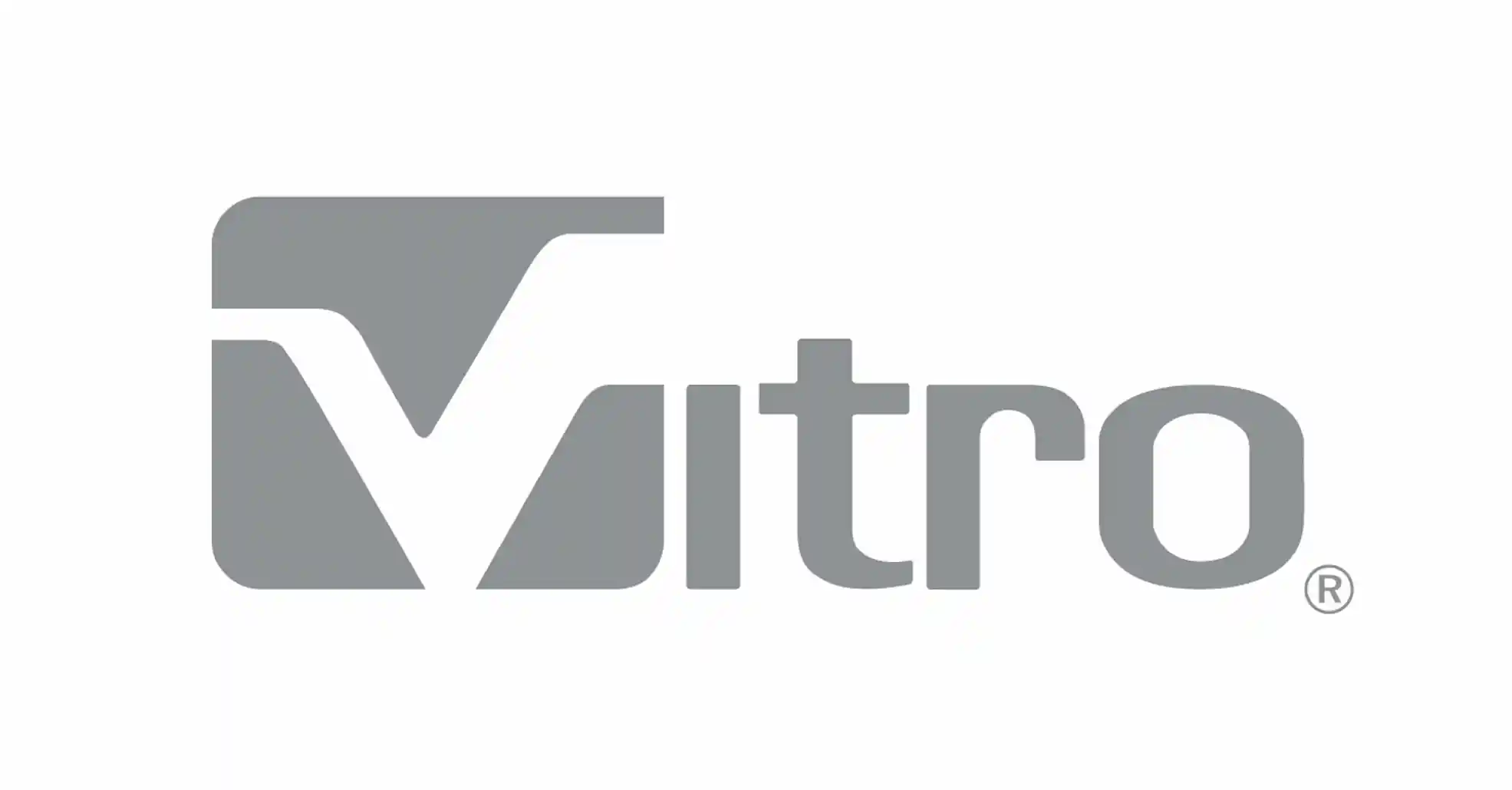 Logotipo gris que presenta la palabra "Vitro" en una fuente estilizada, con la "V" inicial que se asemeja a una forma o símbolo geométrico, sobre un fondo blanco.